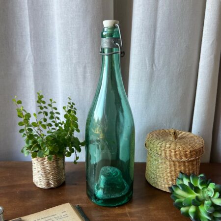 Grande bouteille ancienne en verre épais