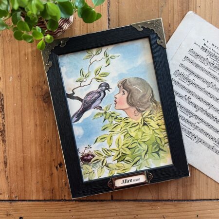 Cadre "Alice et l’oiseau"