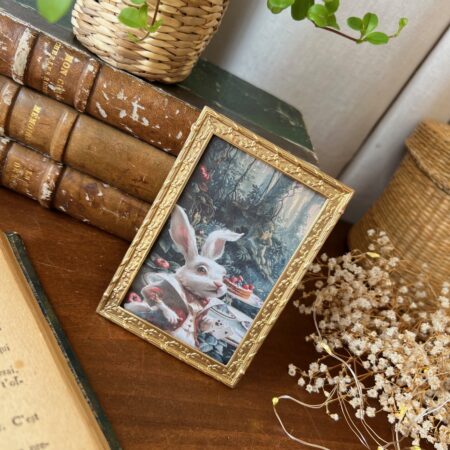 Ancien petit cadre en laiton