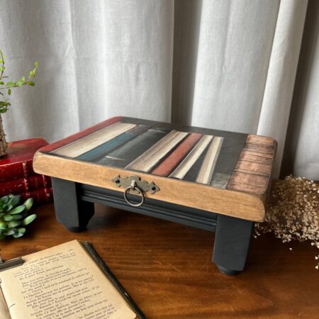 Repose-plante "rat de bibliothèque"