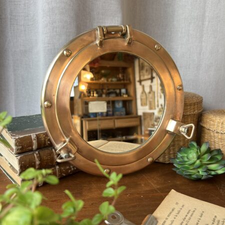 Miroir vintage "hublot" en laiton