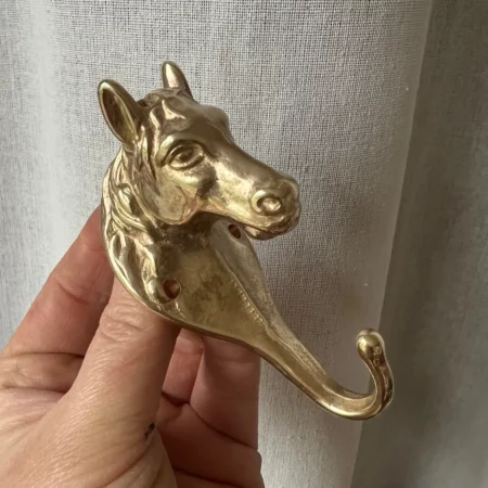 Patère "tête de cheval" en bronze doré